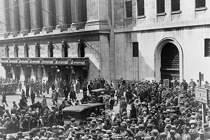 Crowd of people gather outside the New York Stock Exchange following the Crash of 1929. - 1929